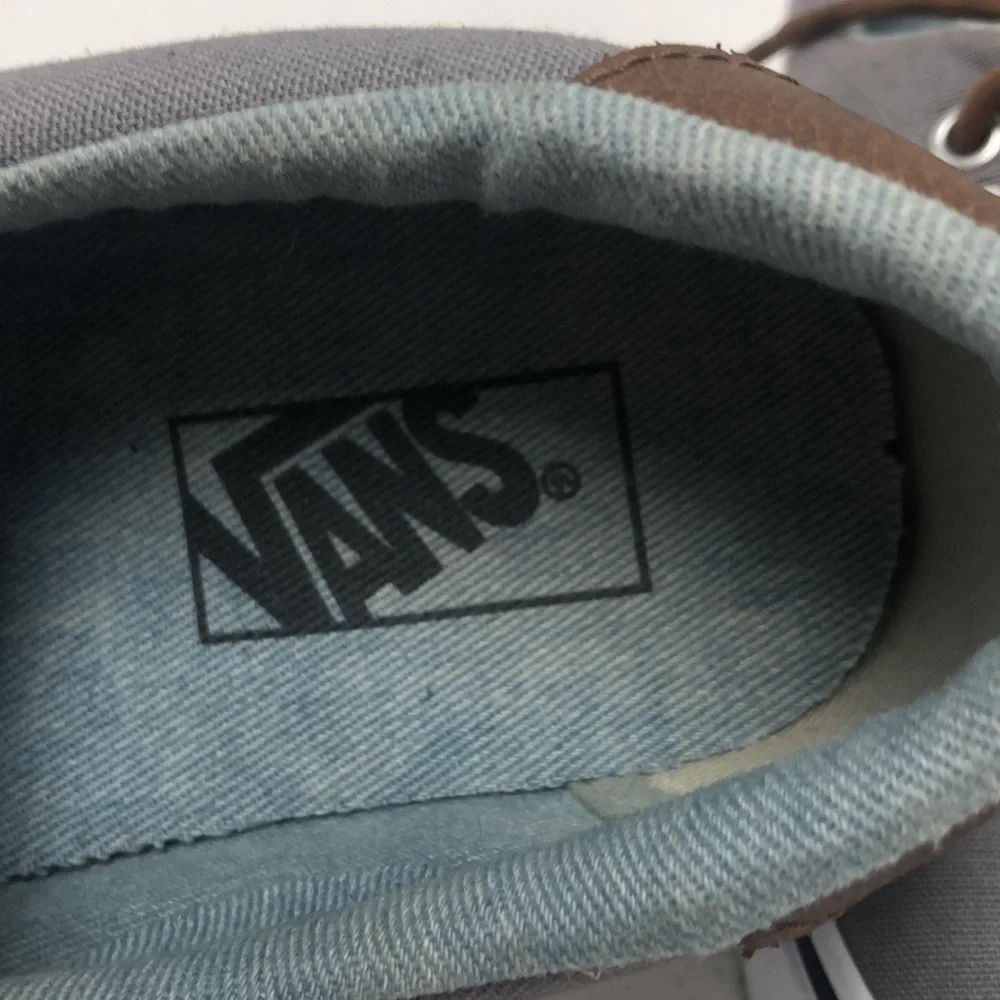 Vans in gray with brown trim